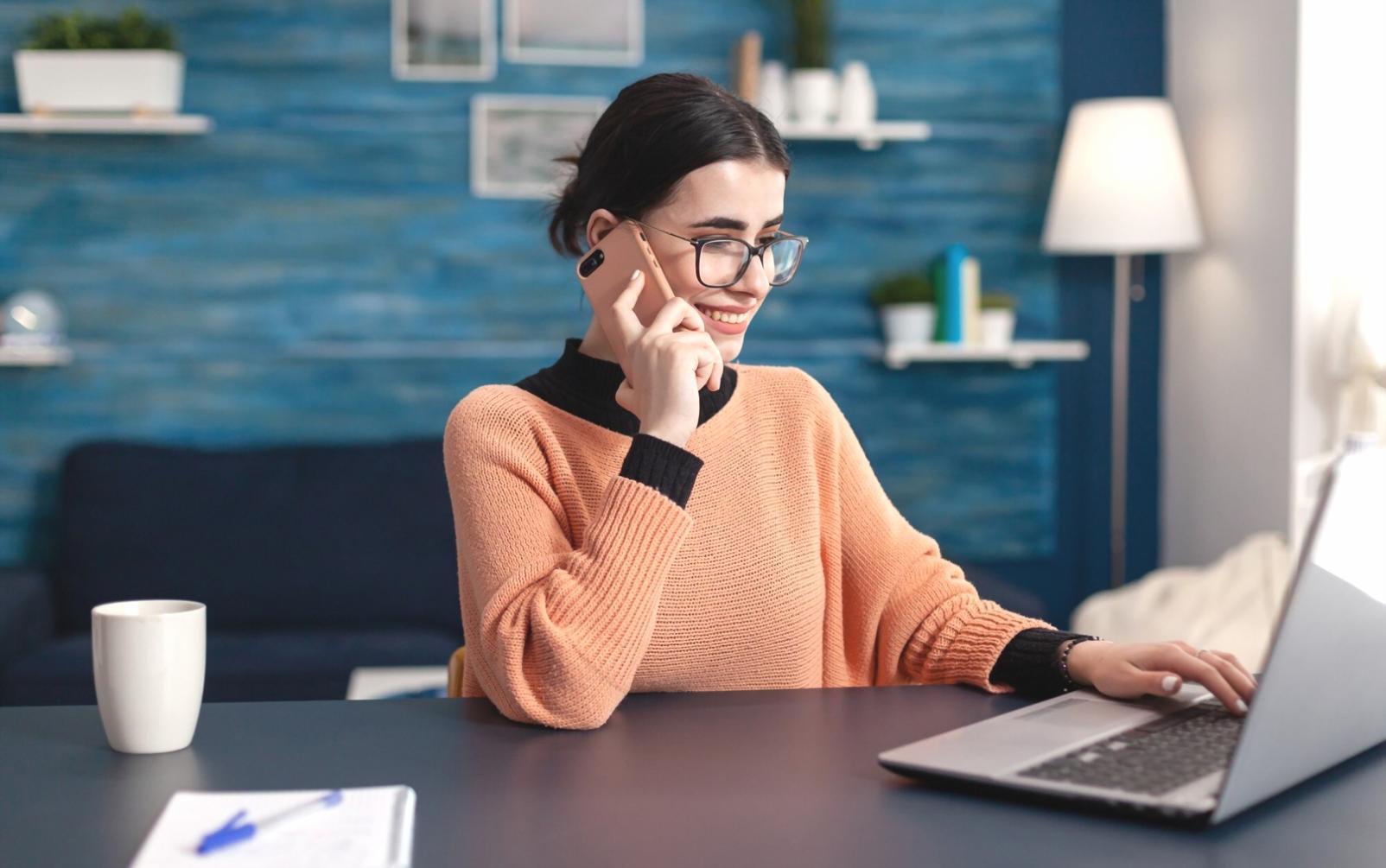 Business owner analyzing financial reports and performance metrics on computer screen